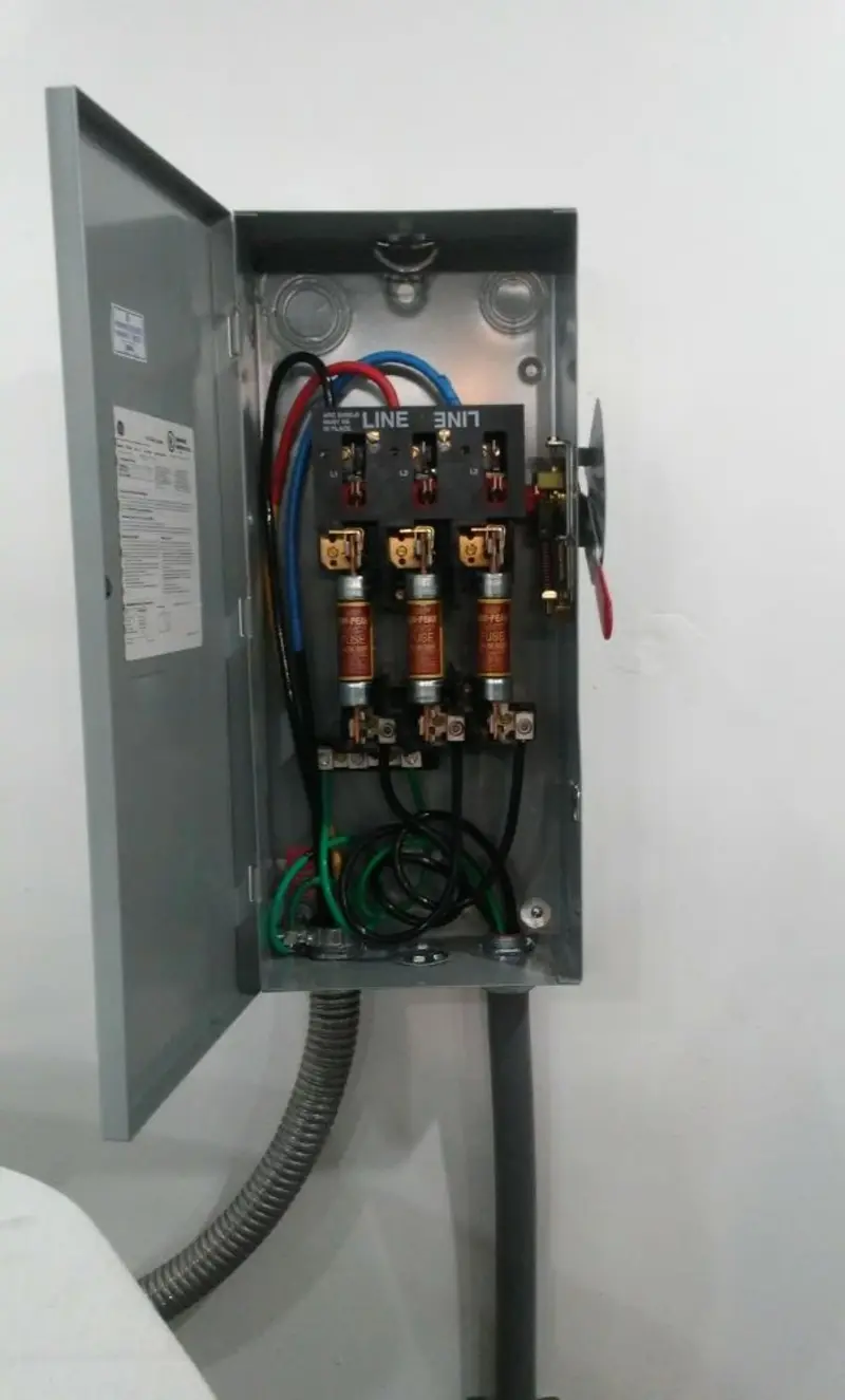 Three-phase disconnect switch installed for Smoke Detector Installation in Taylor Lake Village